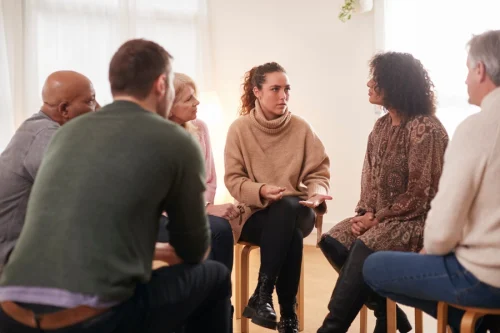 Support network meeting emphasizing accountability in Twelve Step recovery