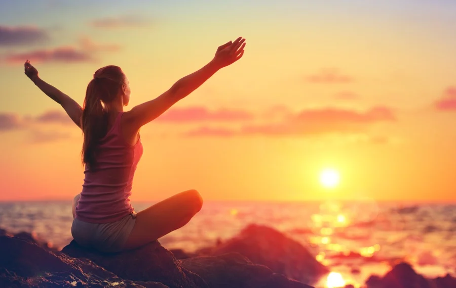 Person reflecting on past experiences during addiction recovery