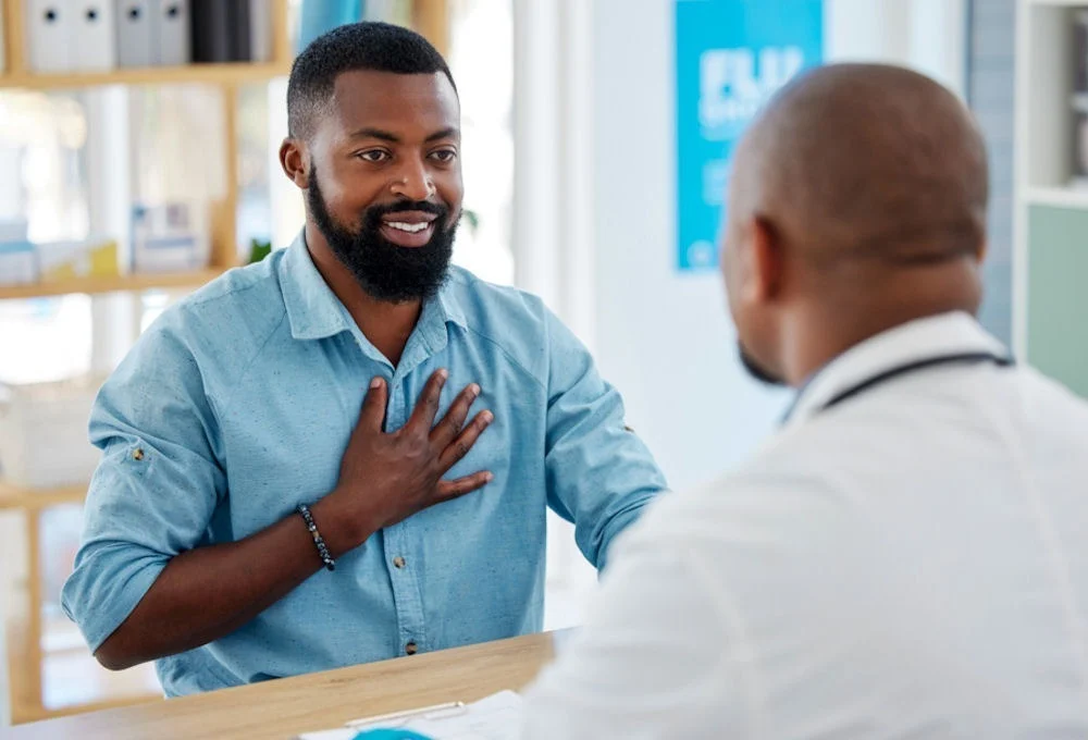 man talking to pharmascist