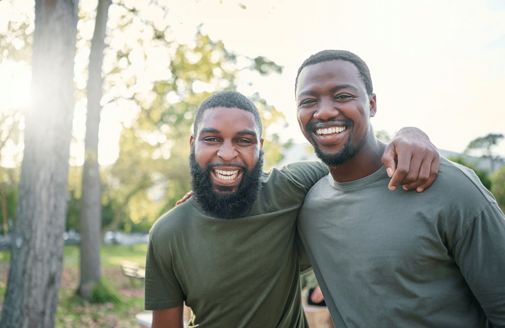 Men in sober living enjoying outdoor activities on a Colorado hiking trail