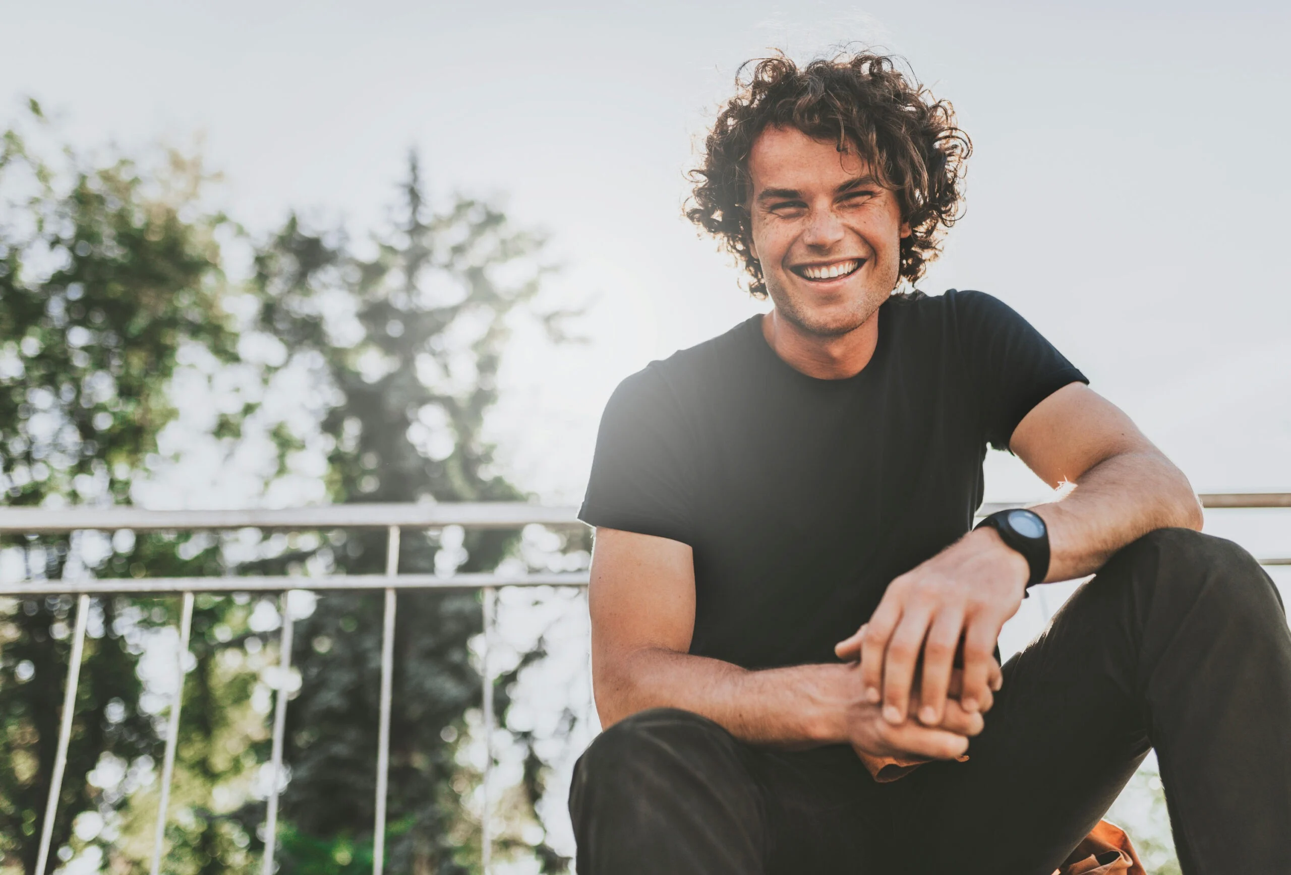 Man in recovery is happy and confident, representing hope after overcoming social anxiety and alcohol use.