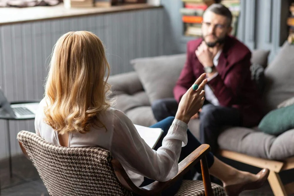 man in therapy after his family learning how to stage an intervention