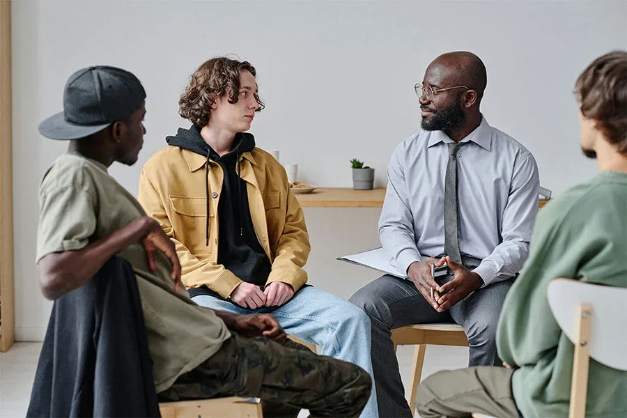 fentanyl-addiction-help-colorado men participating in group therapy during fentanyl addiction treatment in Colorado