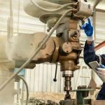 Blue-collar workers performing physically demanding jobs in construction and industrial settings