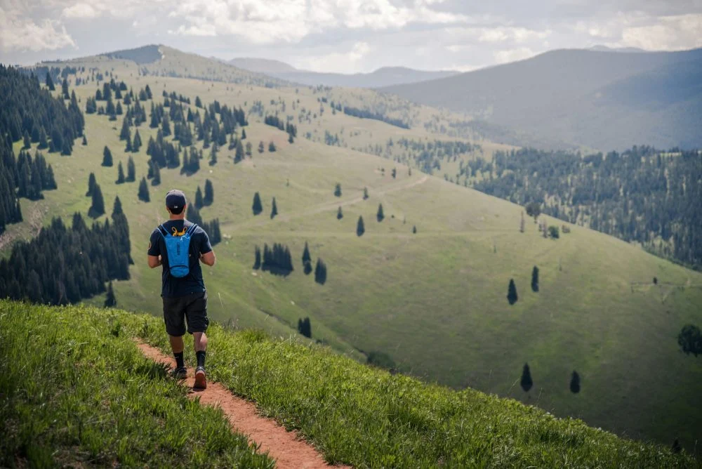 man hiking as part of experiential therapy for recovery