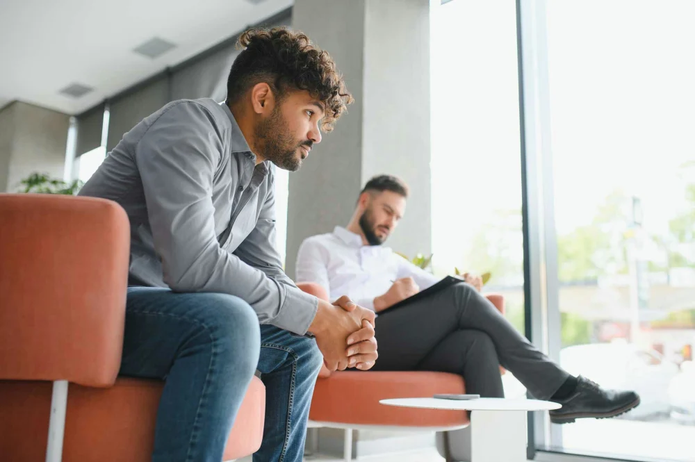 man comforted after not receiving rehab visits