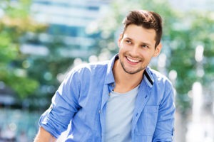 man smiling outside