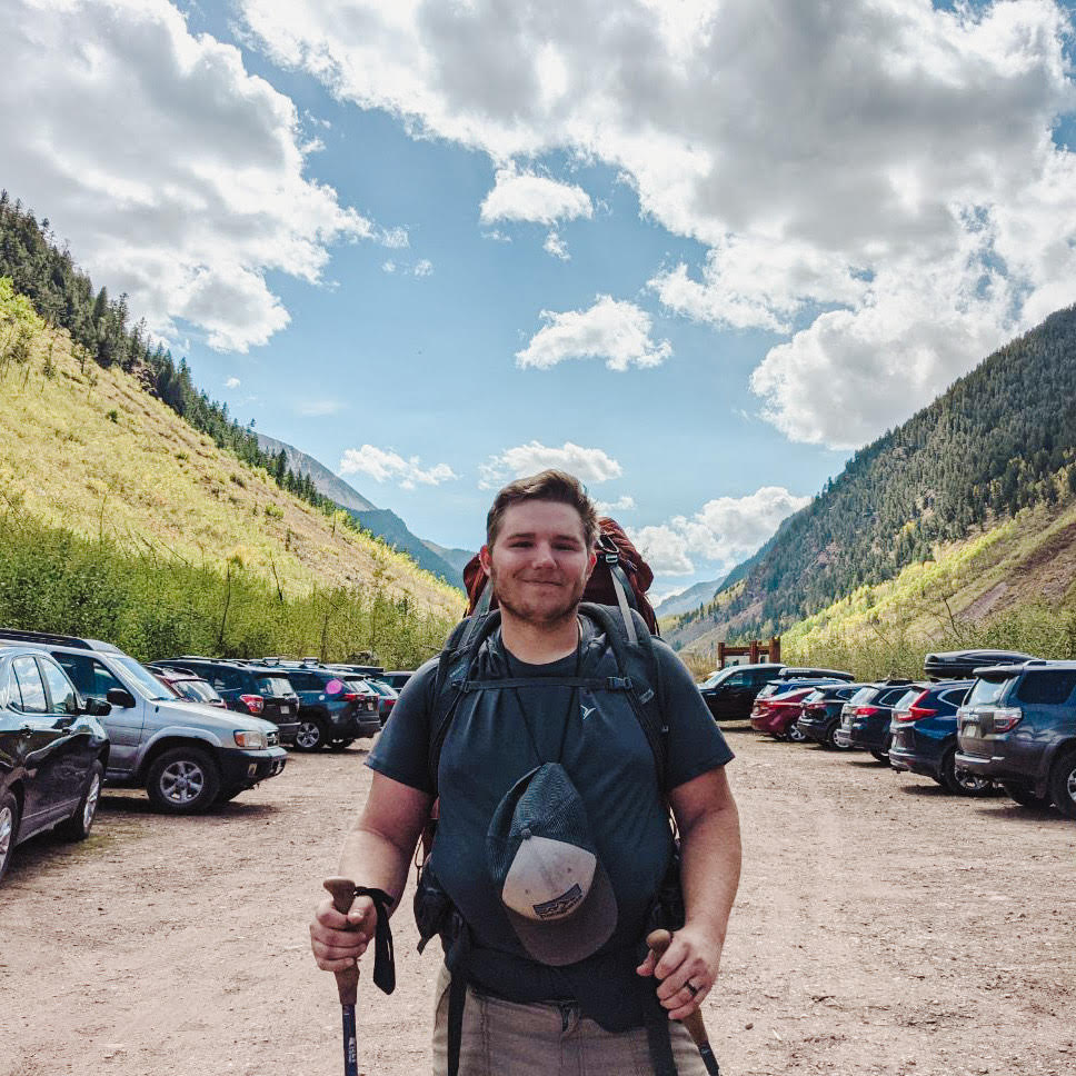 Photo of Tyler Hoover on a hike.