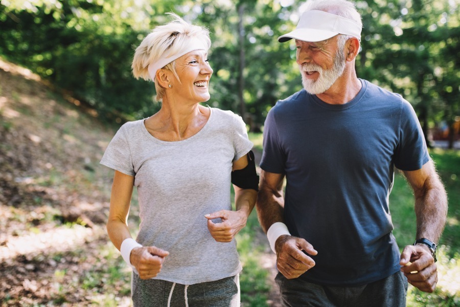 elderly couple exercising together