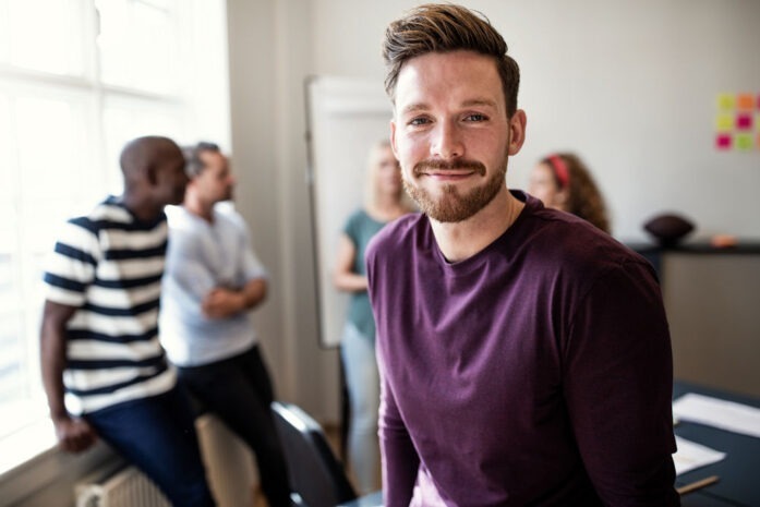 man in a group therapy session