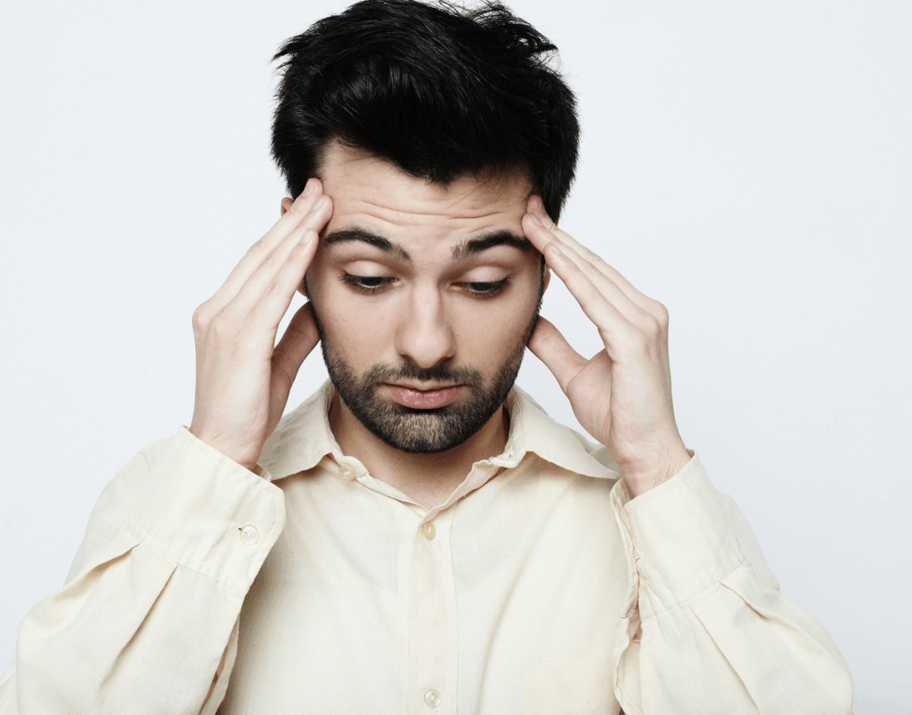 Adult experiencing dizziness and drowsiness, common side effects of mixing gabapentin and alcohol.